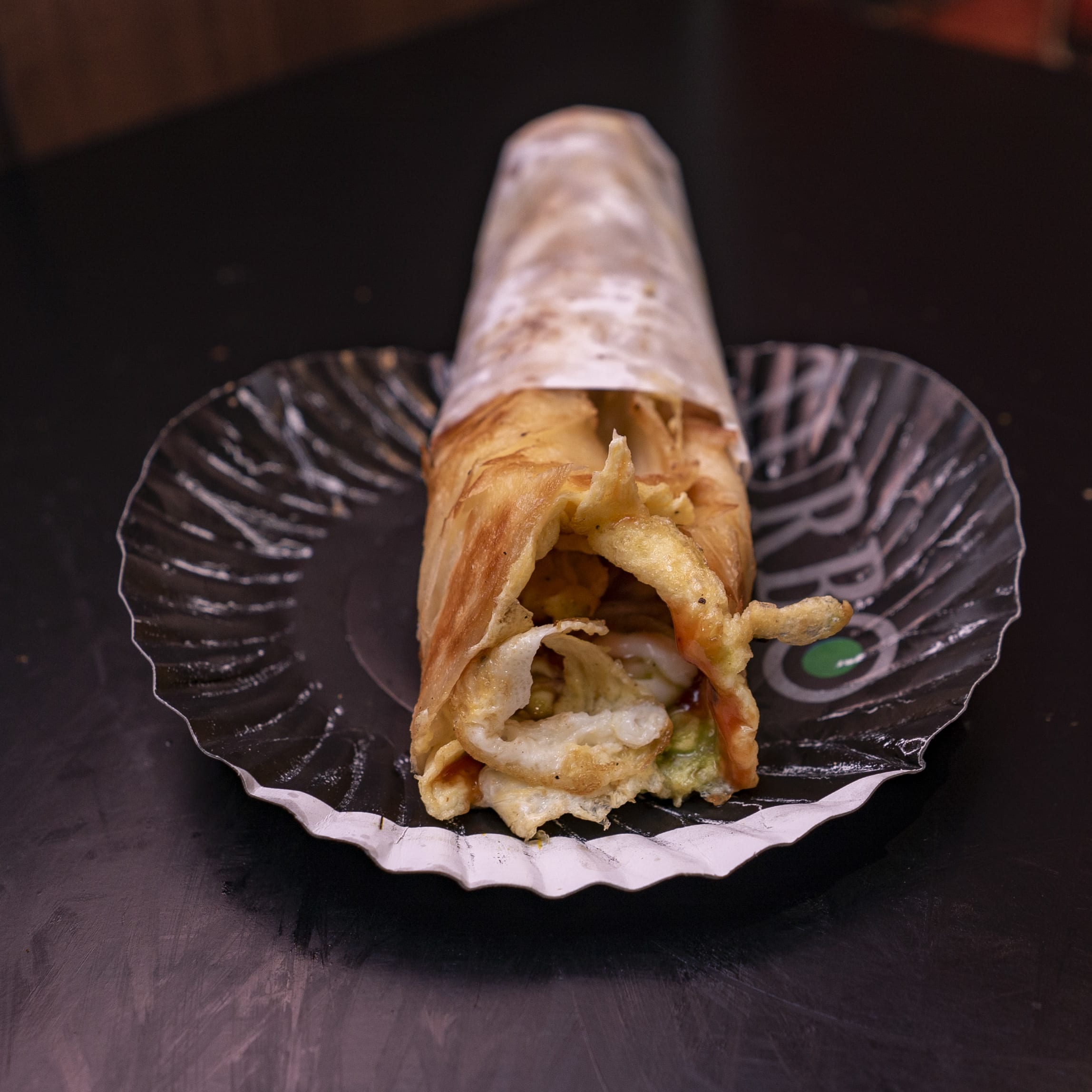 24 hrs kathi roll v/s tawa parantha - Logo