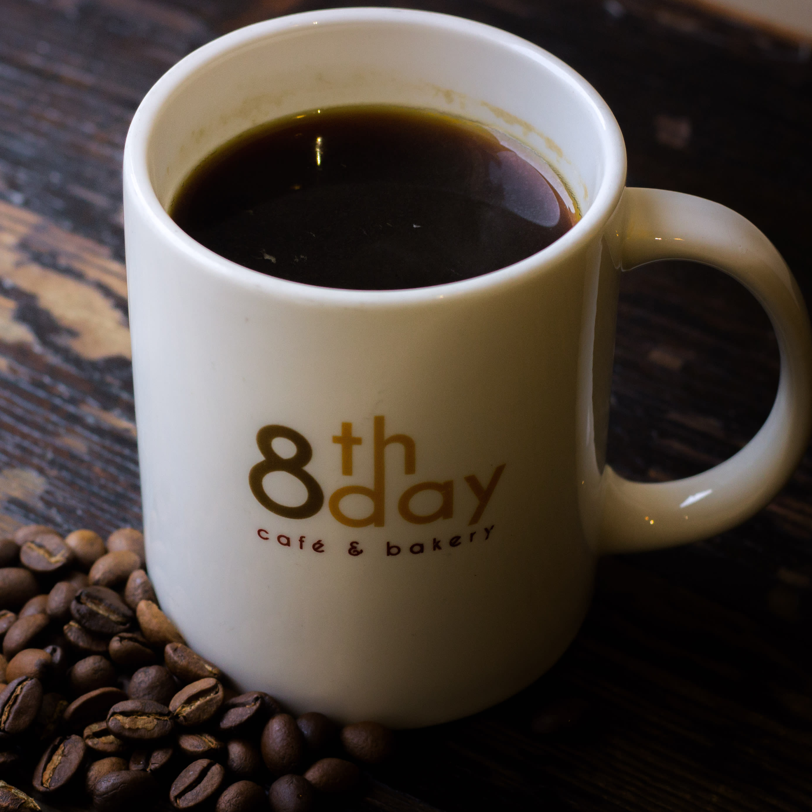 8th Day Cafe & Bakery - Logo