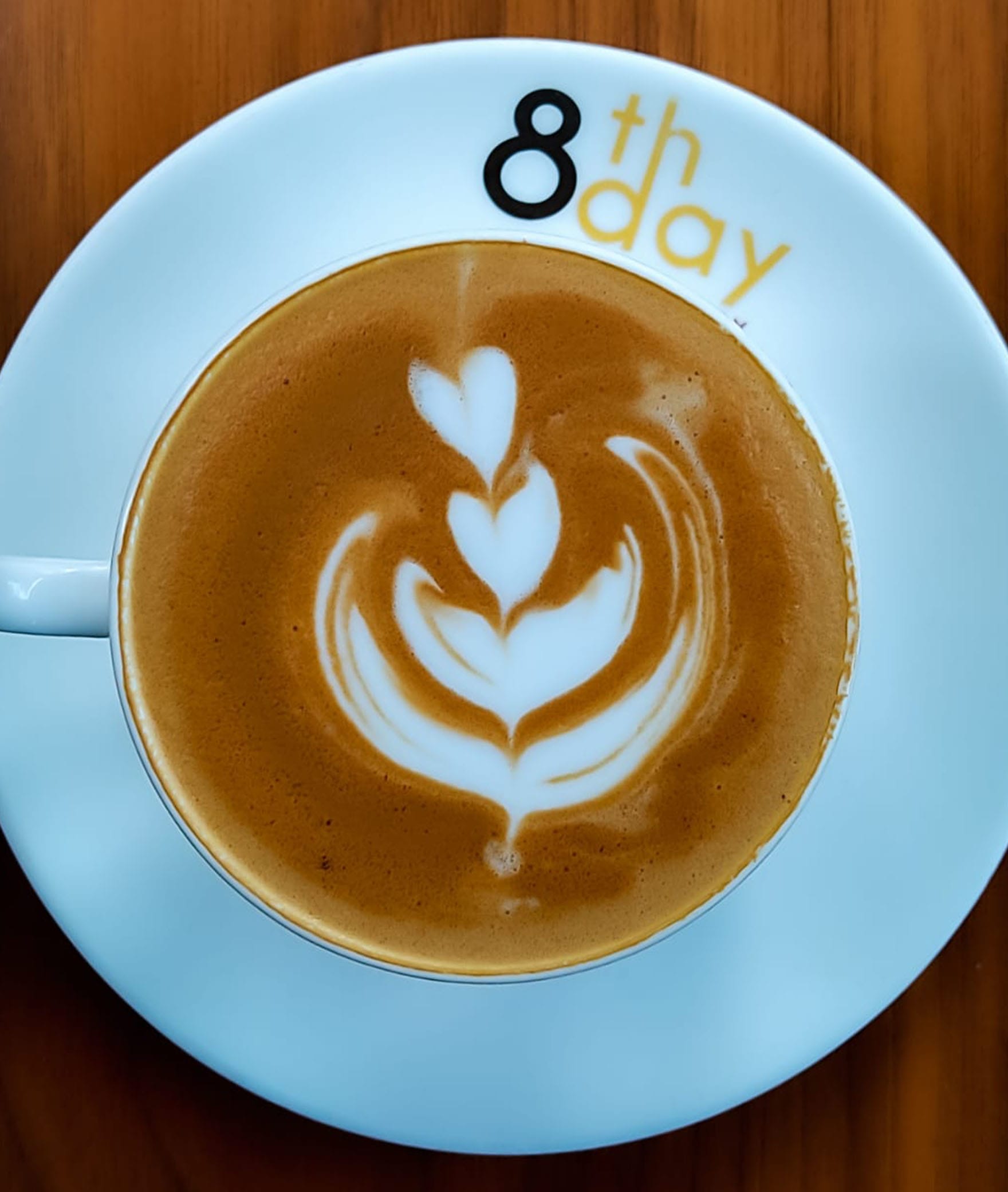 8th Day Cafe & Bakery - Logo
