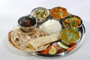 Aamritsari Kulcha Radhe Radhe - Logo