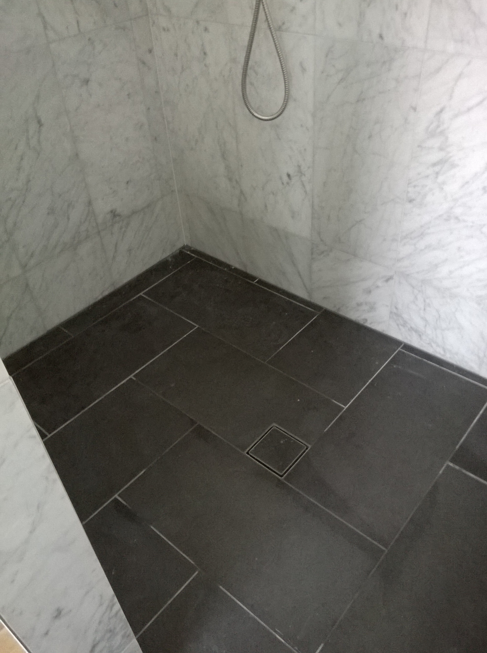 Aaron Wockner Tiling - Logo