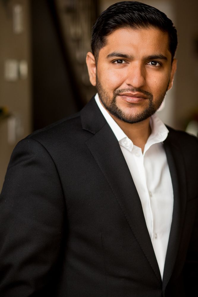 Abid Hussain - RE/MAX Realty Specialists Inc - Logo