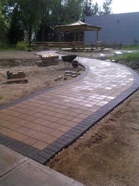 Adrenaline Concrete &a; Landscaping - Logo