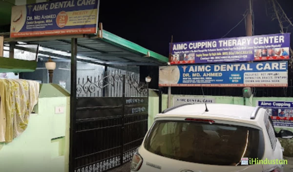 AIMC Dental Care and Implant centre - Logo