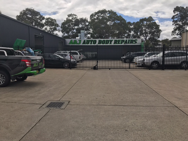 A & J Auto Body Repairs - Logo