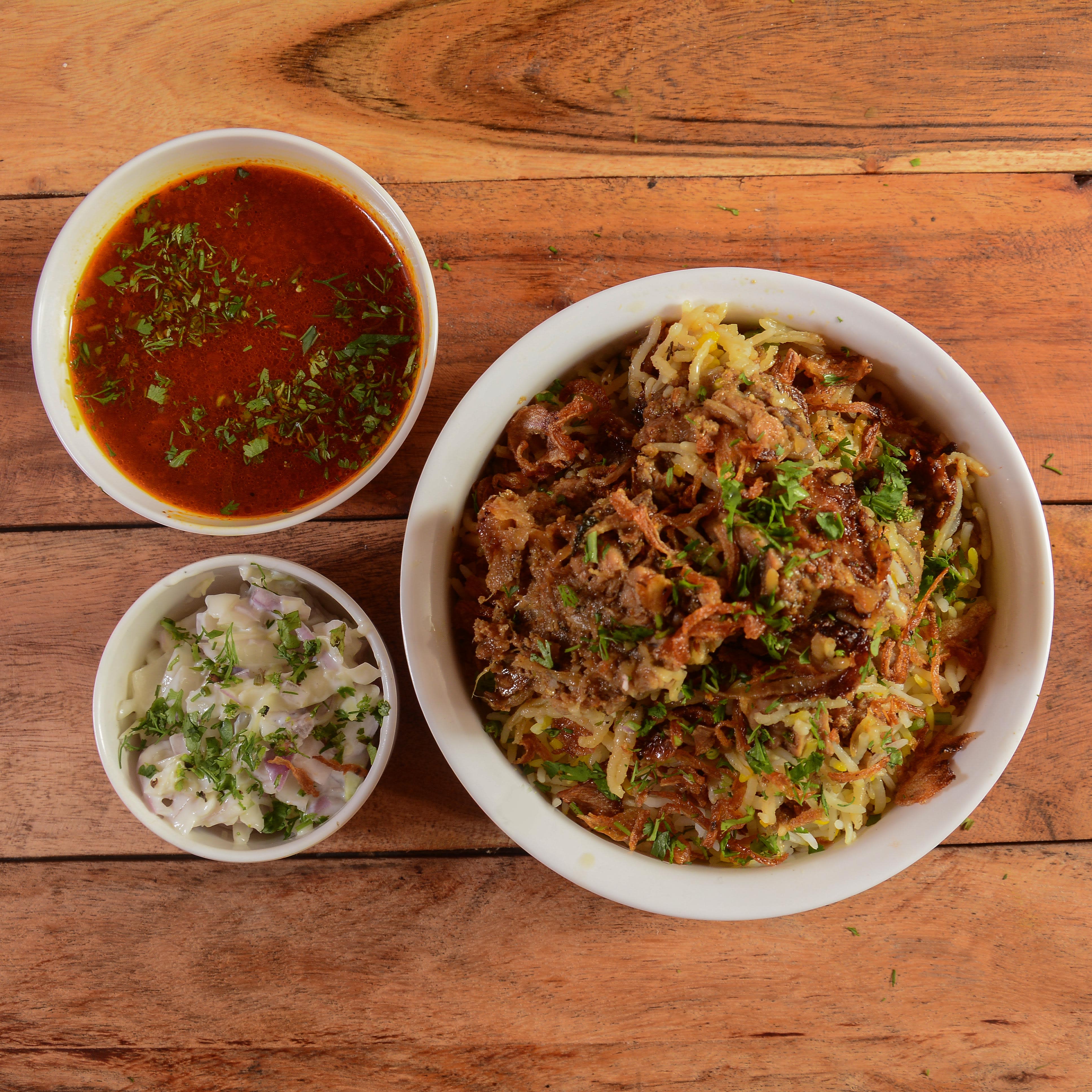 AK Caterers & Biryani House - Logo