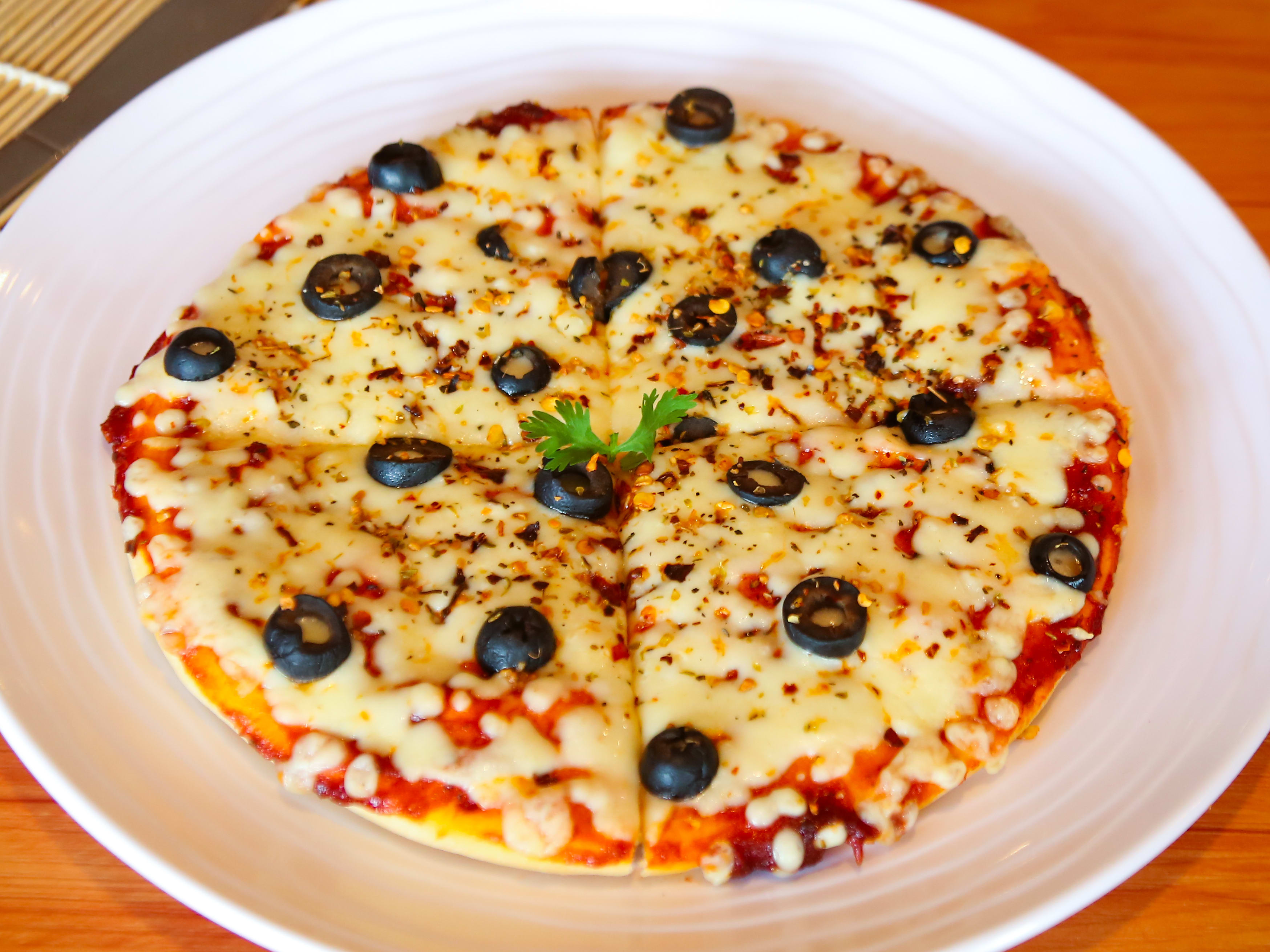 Al Laziz Pizza & Momos - Logo