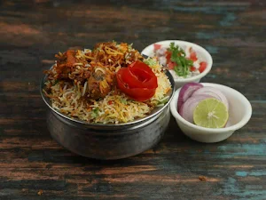 Al Madina Biryani House - Logo