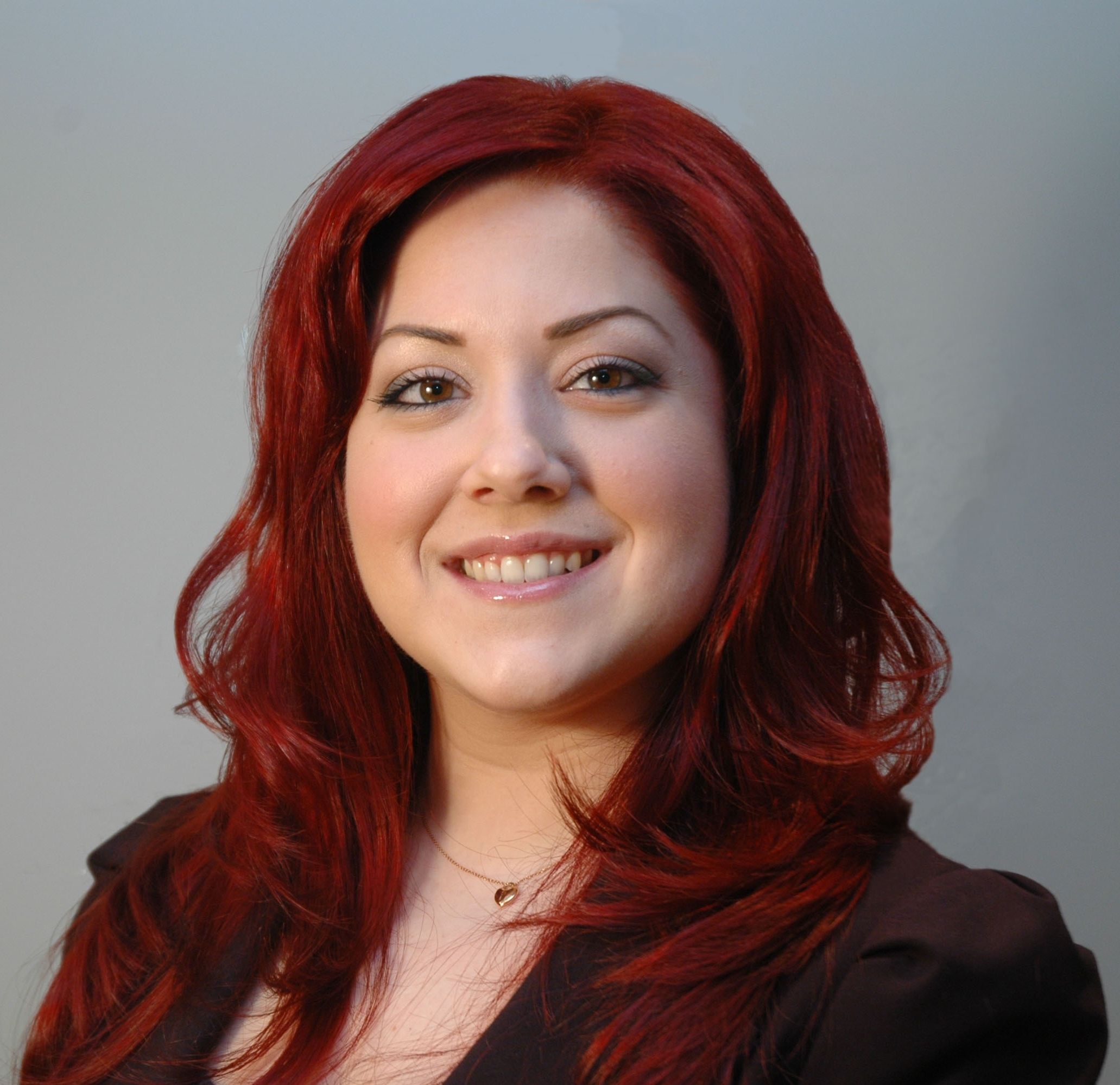Amanda Florio, Sales Representative- Right At Home Real - Logo
