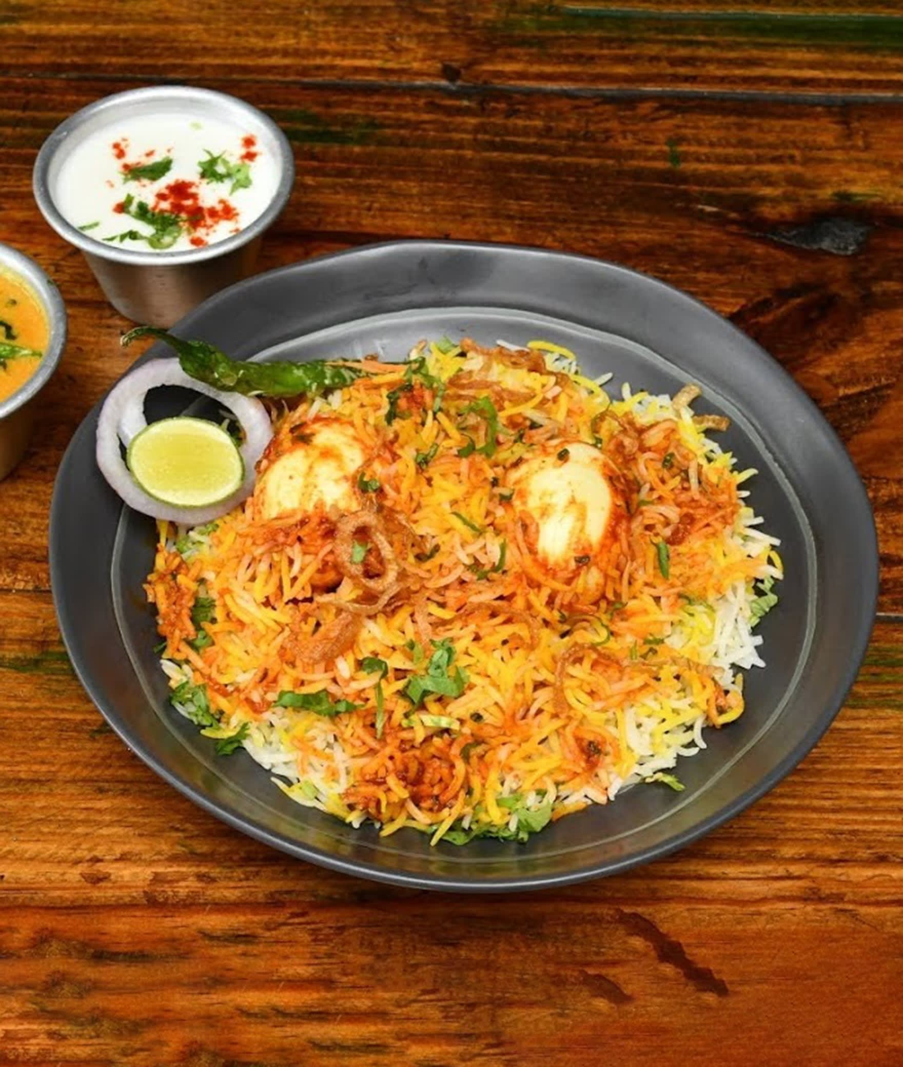 Ambur ajib biriyani - Logo