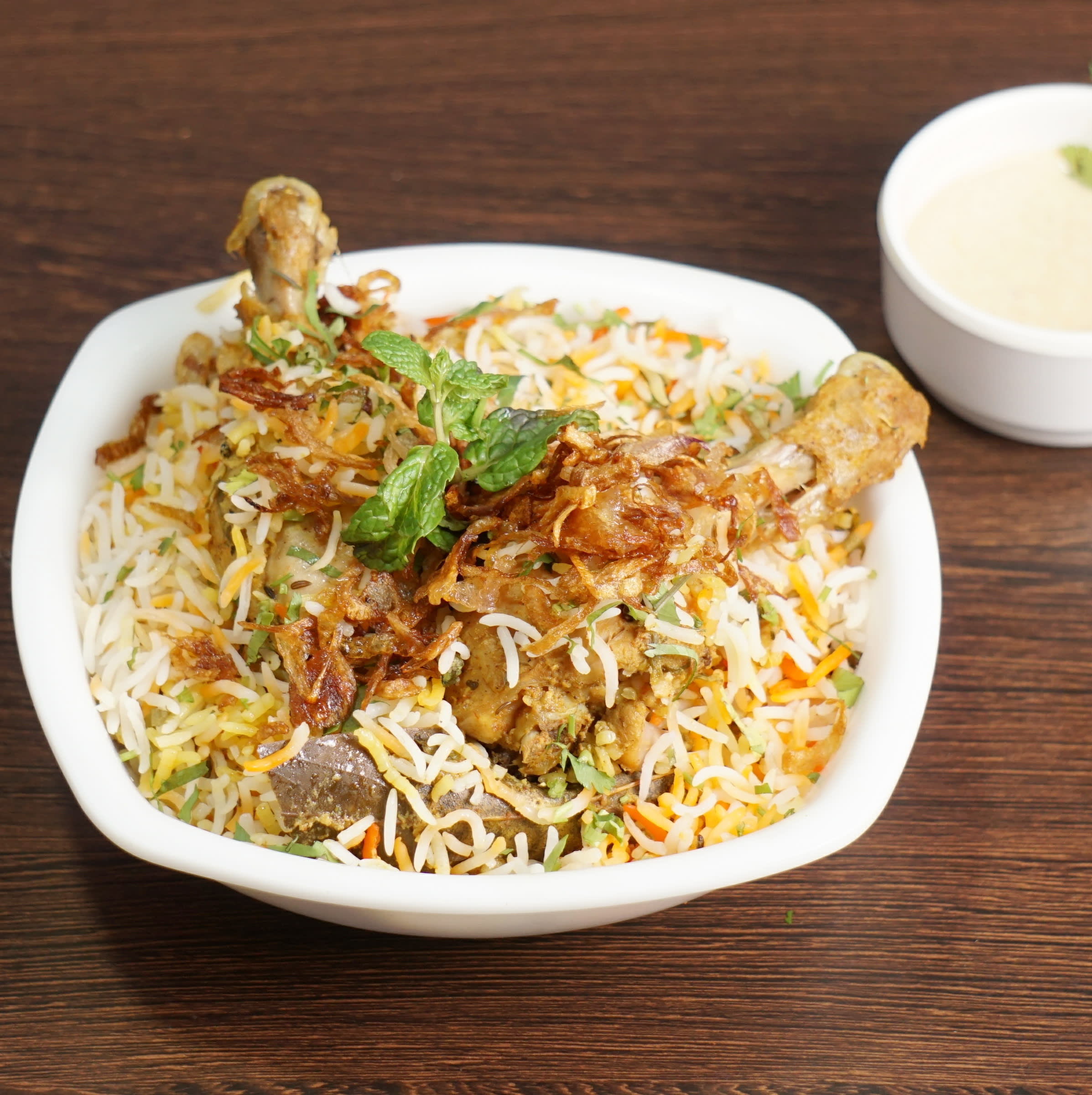 Ammi's Biryani - Logo