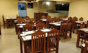 Amol Restaurant - Logo