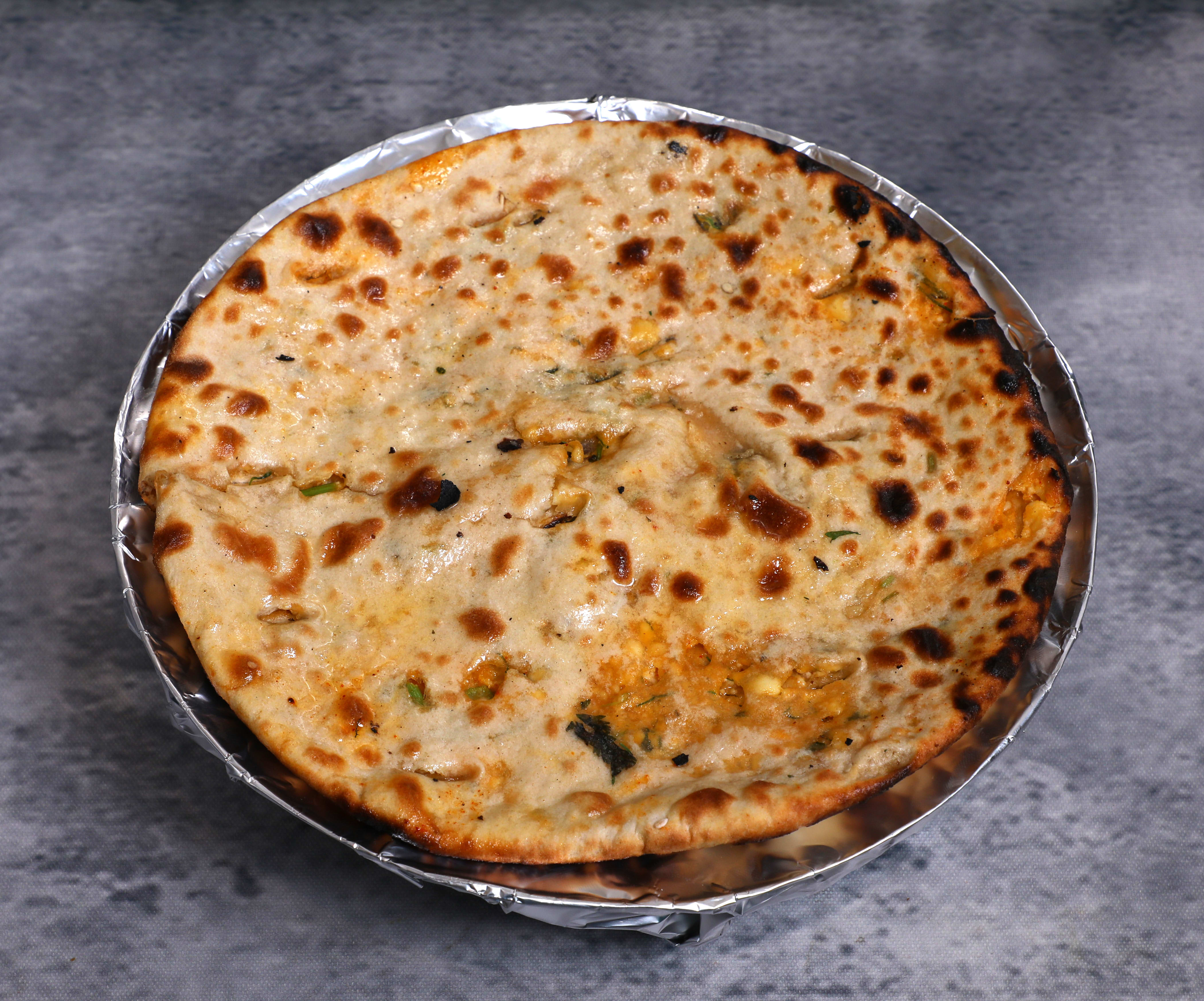 Amritsari kulcha and Naan corner - Logo