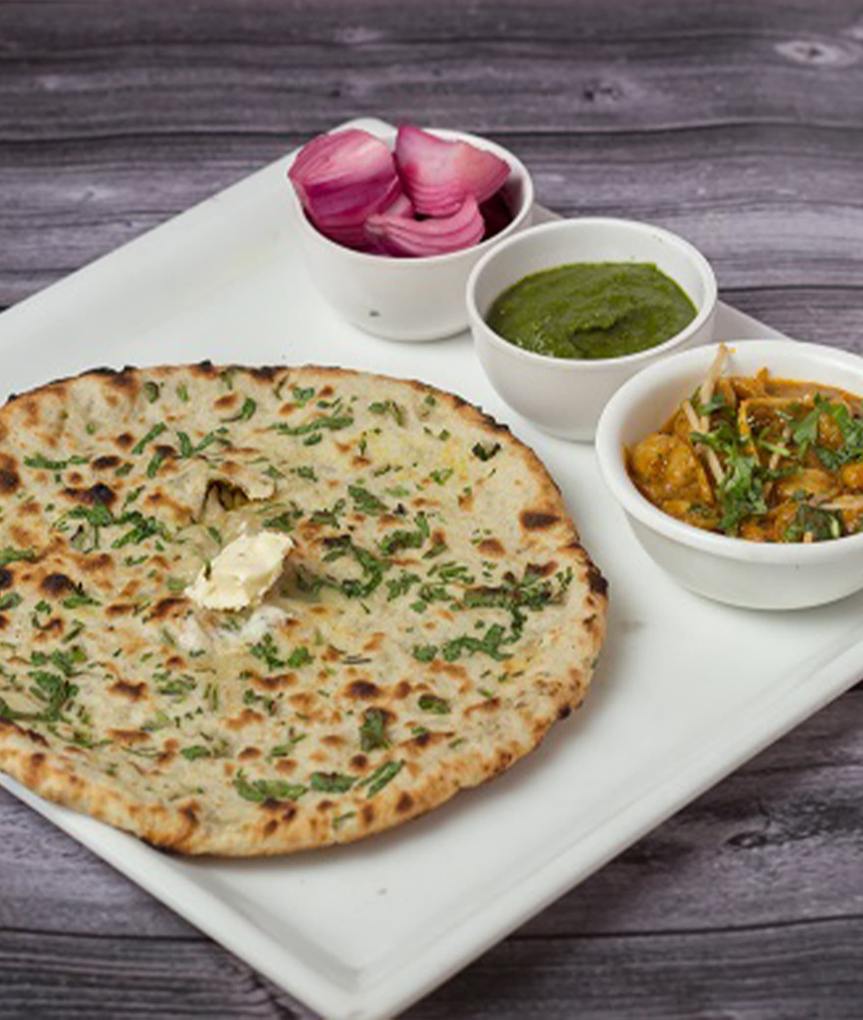 Amritsari Kulcha Point - Logo