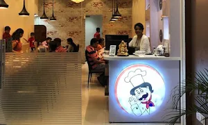 Amruta Multi Cuisine restaurant - Logo