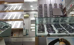 Amrut Opticians - Logo
