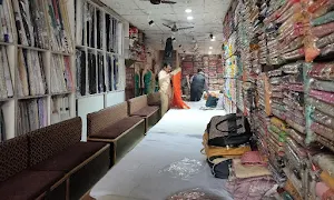 Anand Clothing Store - Logo