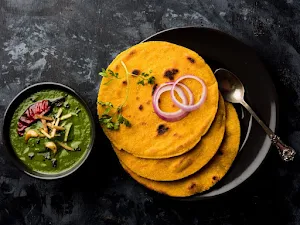 Anand Sweets And Savouries - Logo
