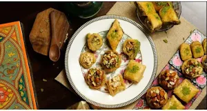 Anand Sweets And Savouries - Logo