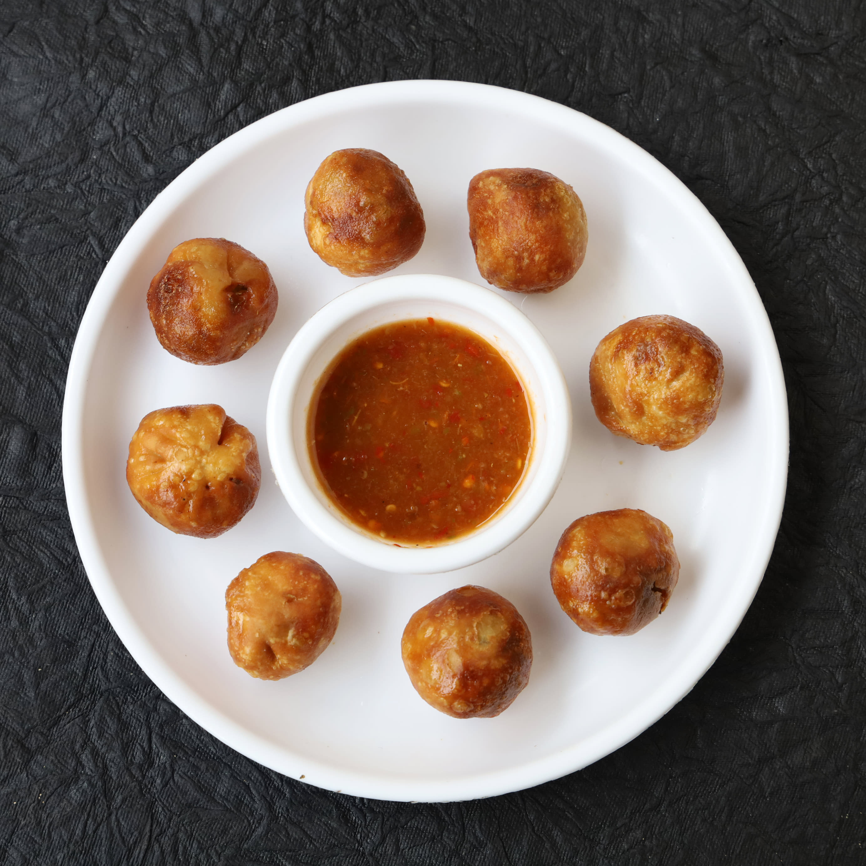Ananya Momos - Logo