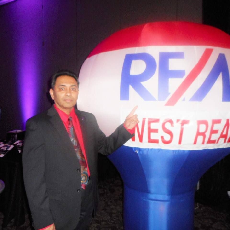 Andrew Fernando - RE/MAX West Realty Inc. - Logo
