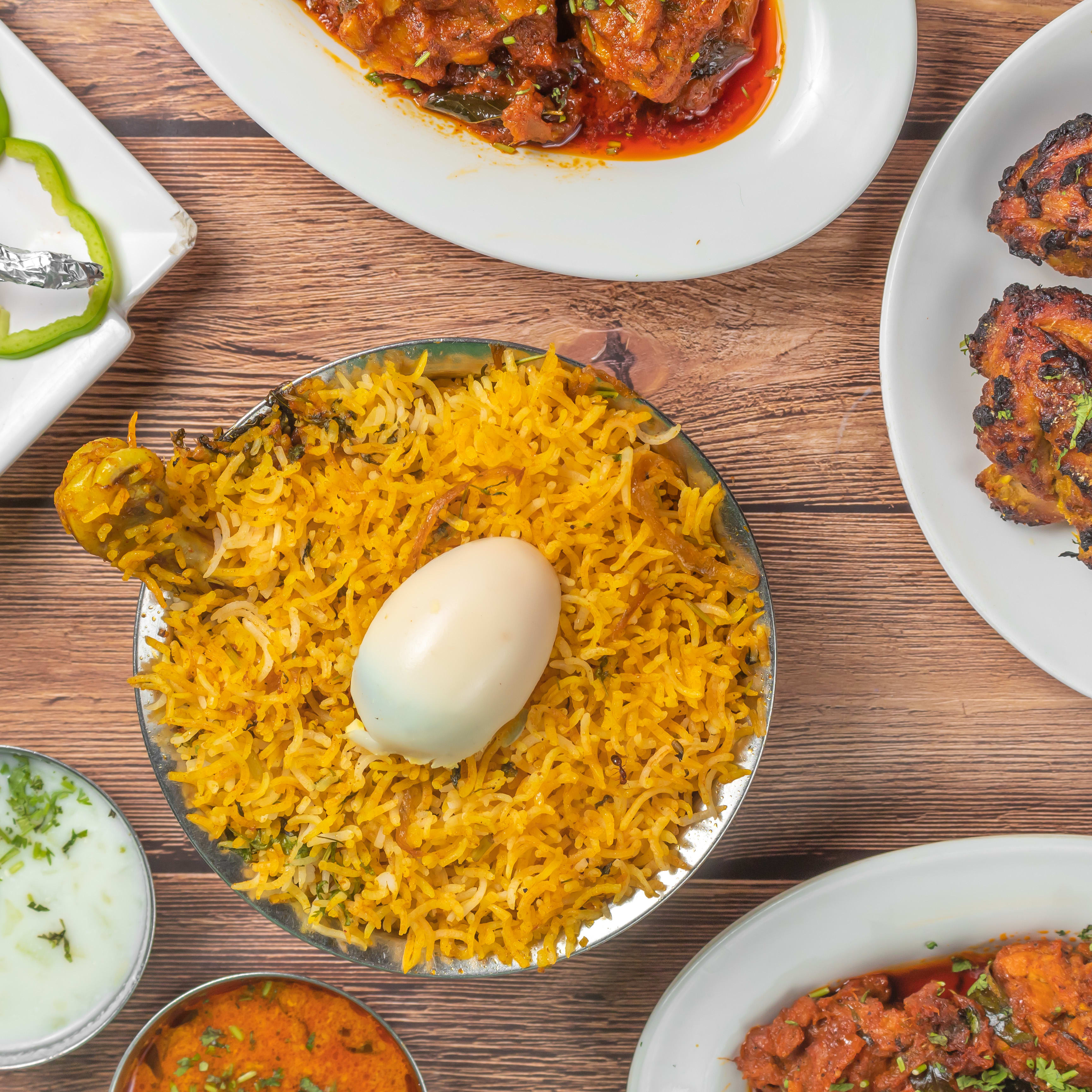 Anmol The Family Cuisine - Logo