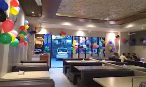 Annapoorna Costal Treat Family Resto N Bar - Logo
