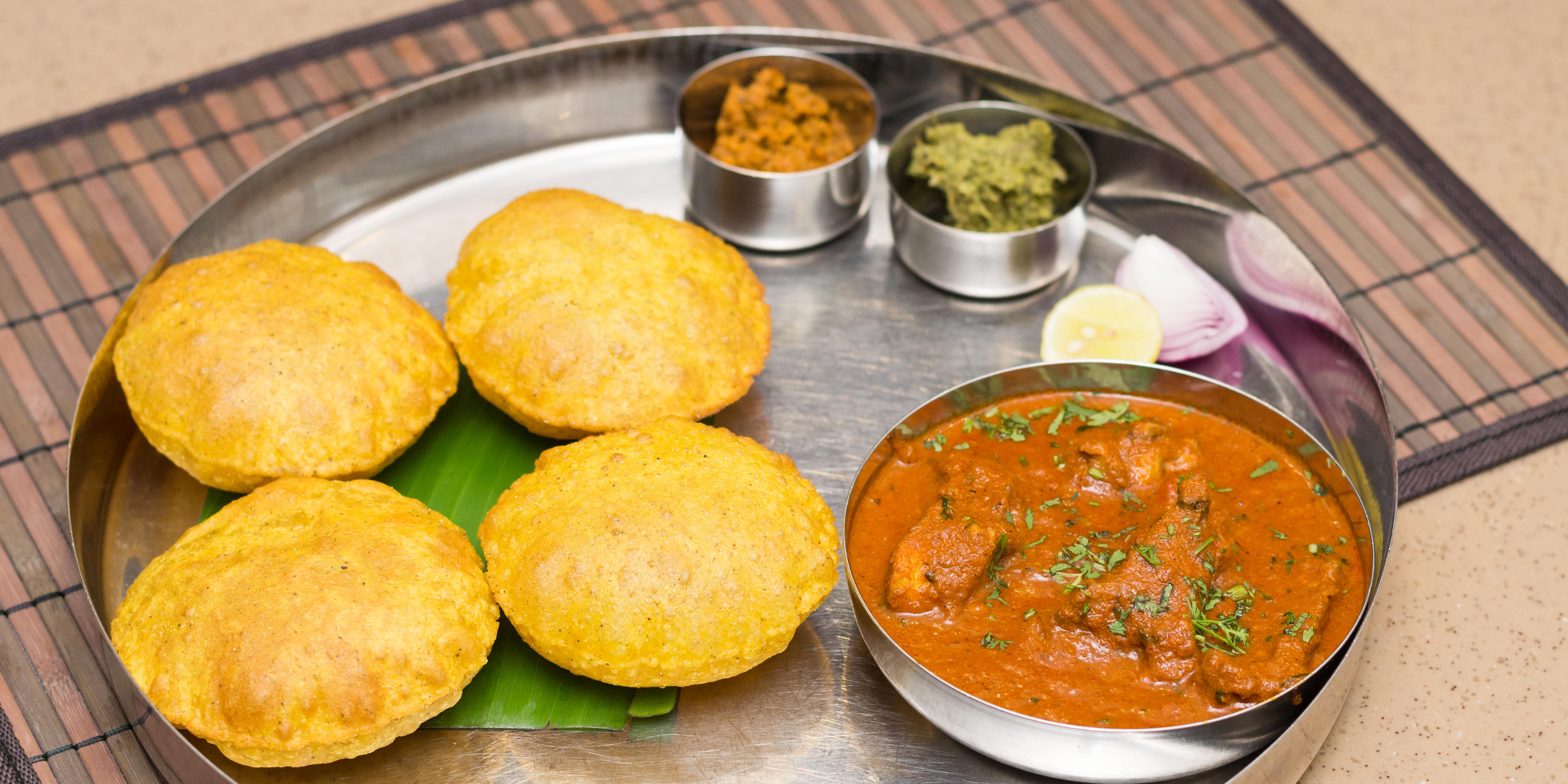 Aradhana Coastal Delight - Logo