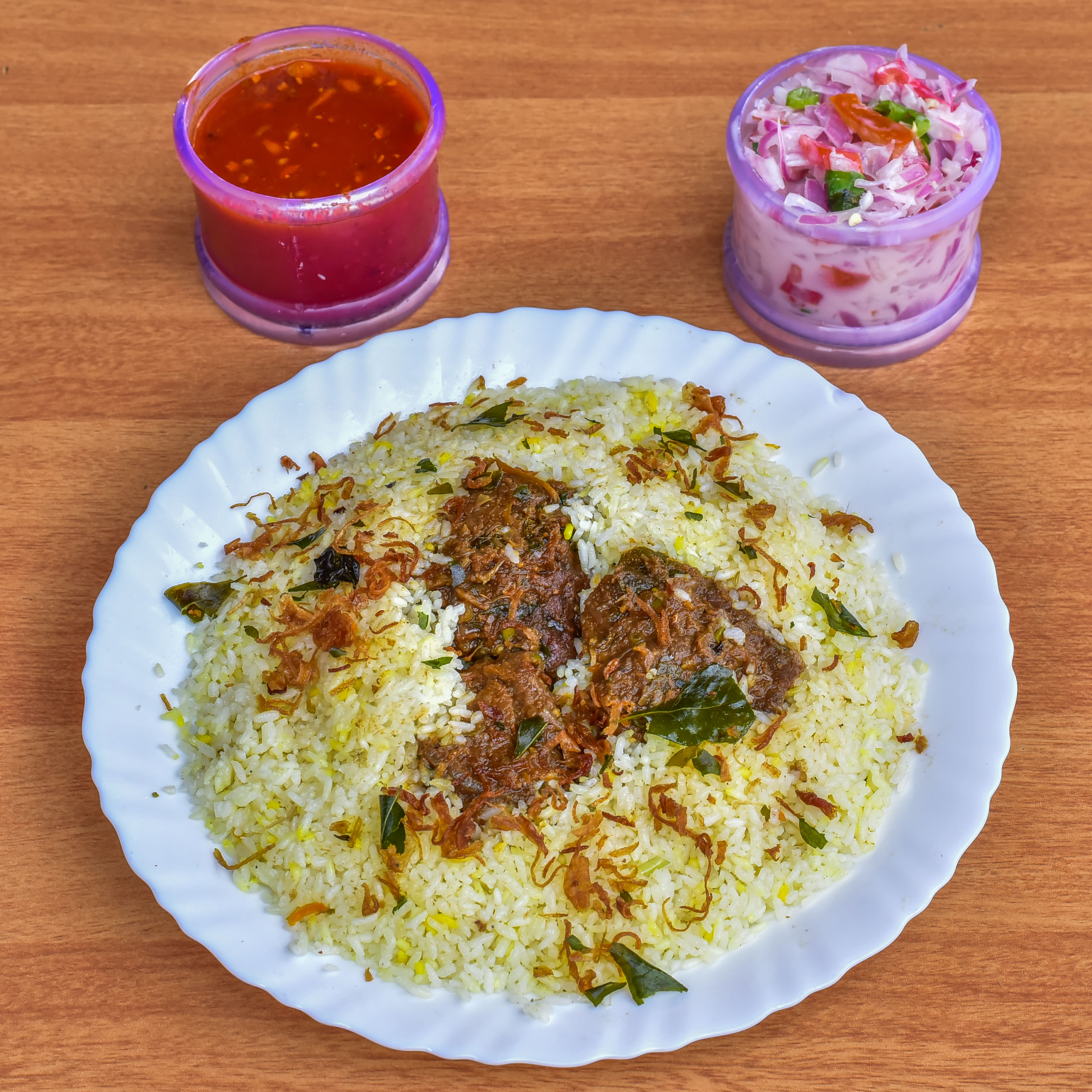 Arafa Manjali Biriyani House - Logo