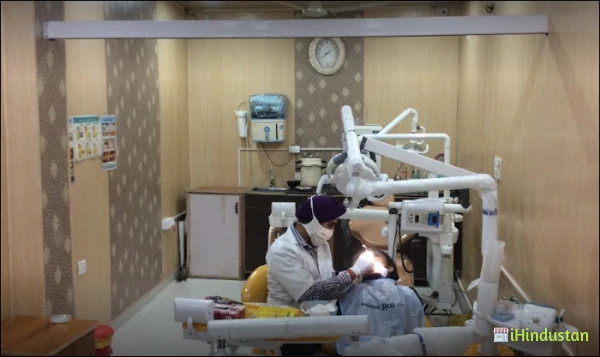 ARORA DENTAL CARE AND IMPLANT CENTRE - Logo