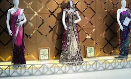 Arun Vastra Bhandar - Logo