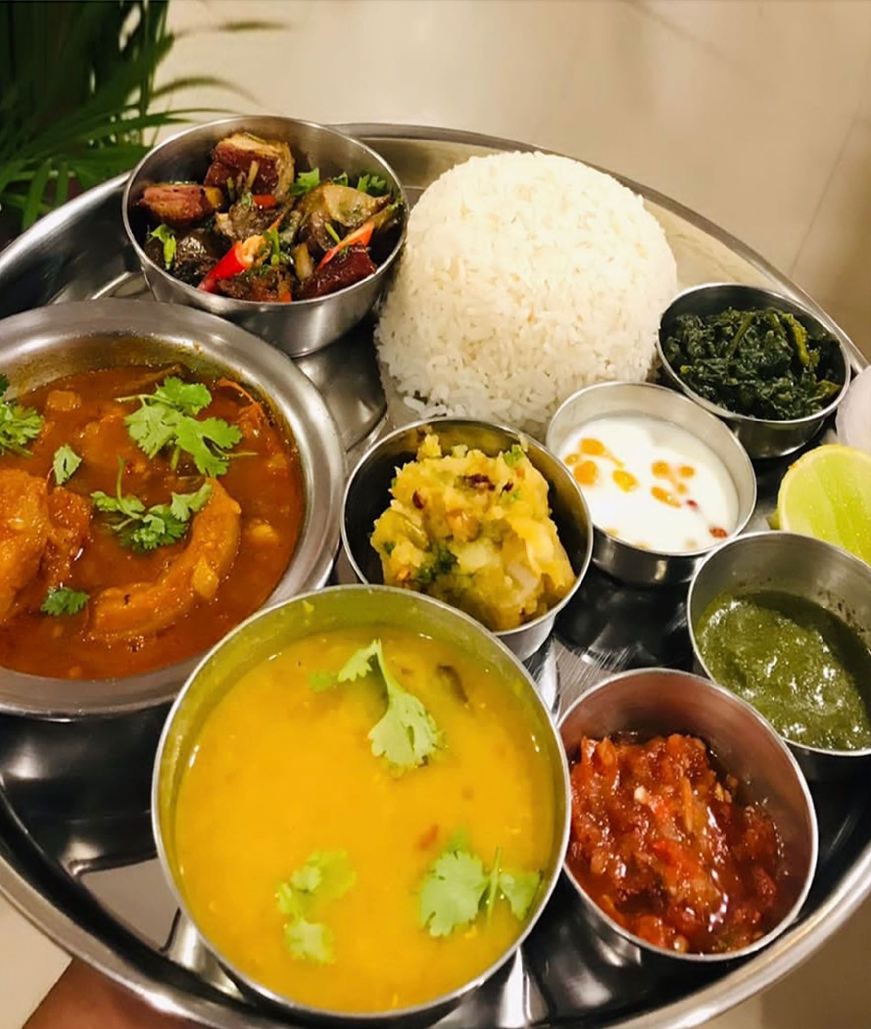 Axomi - Taste of Assam - Logo