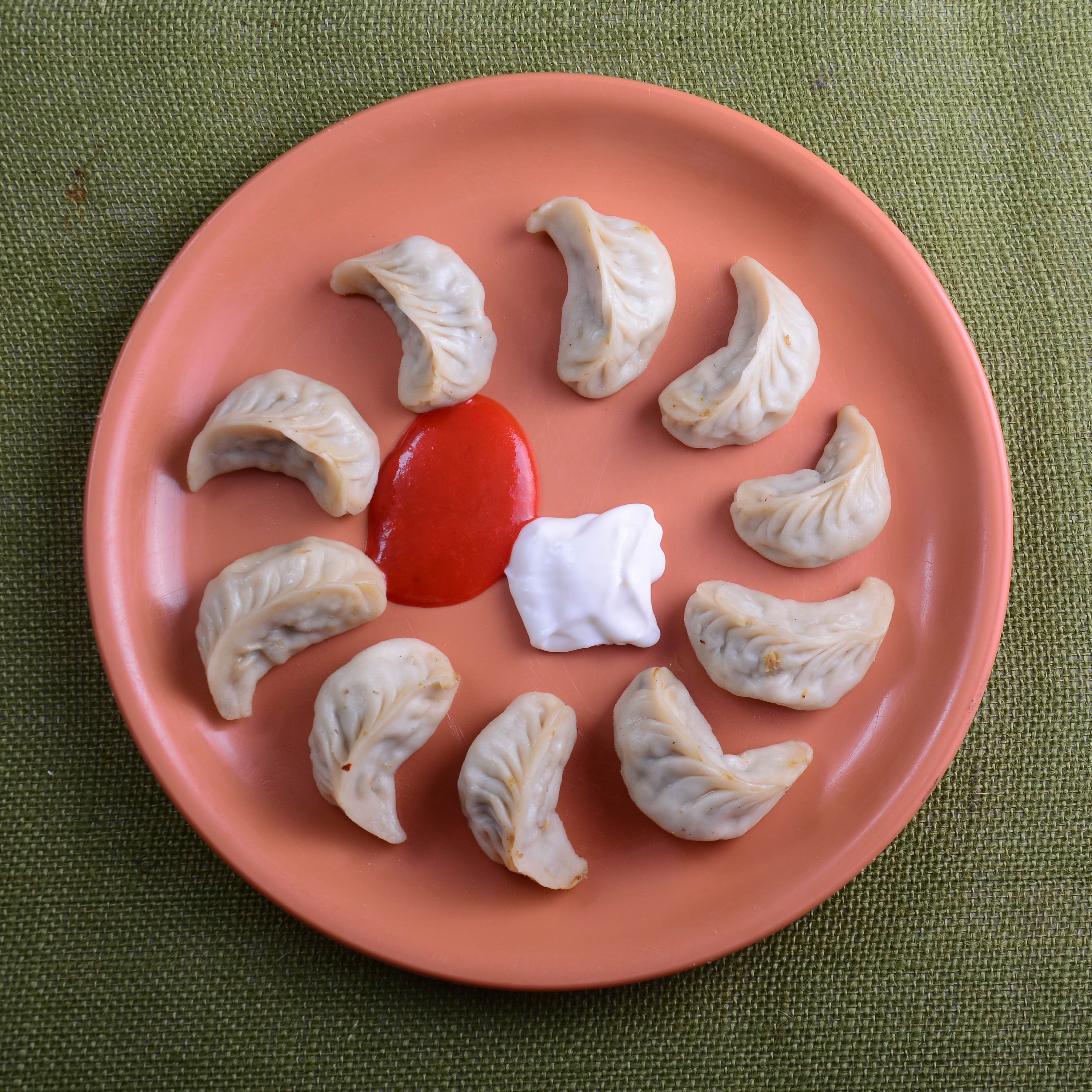 Ayushi Chinese and Rolls - Logo