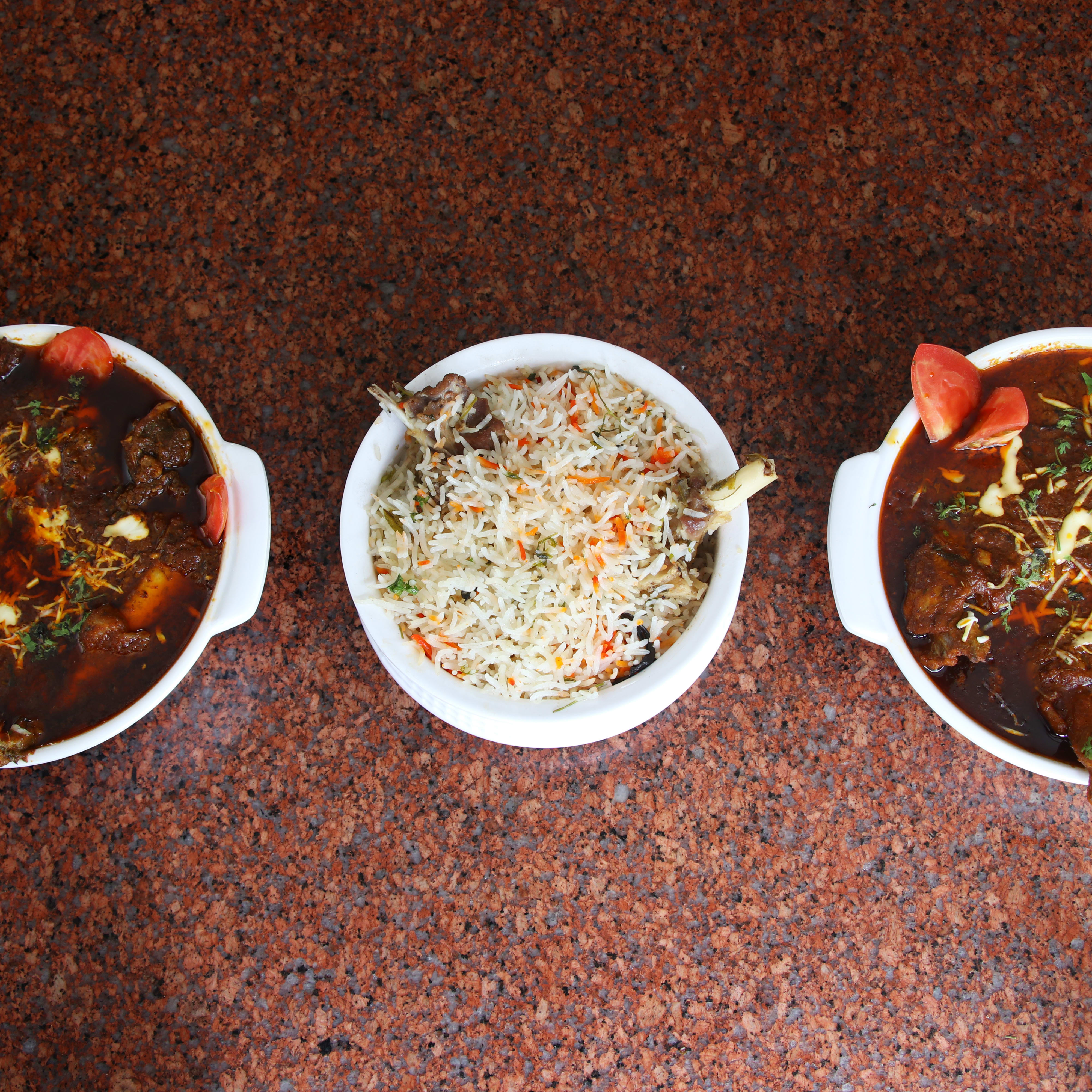 Babbu Plaza Restaurant - Logo