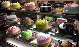 Bake My Cake By Hiralal's - Logo