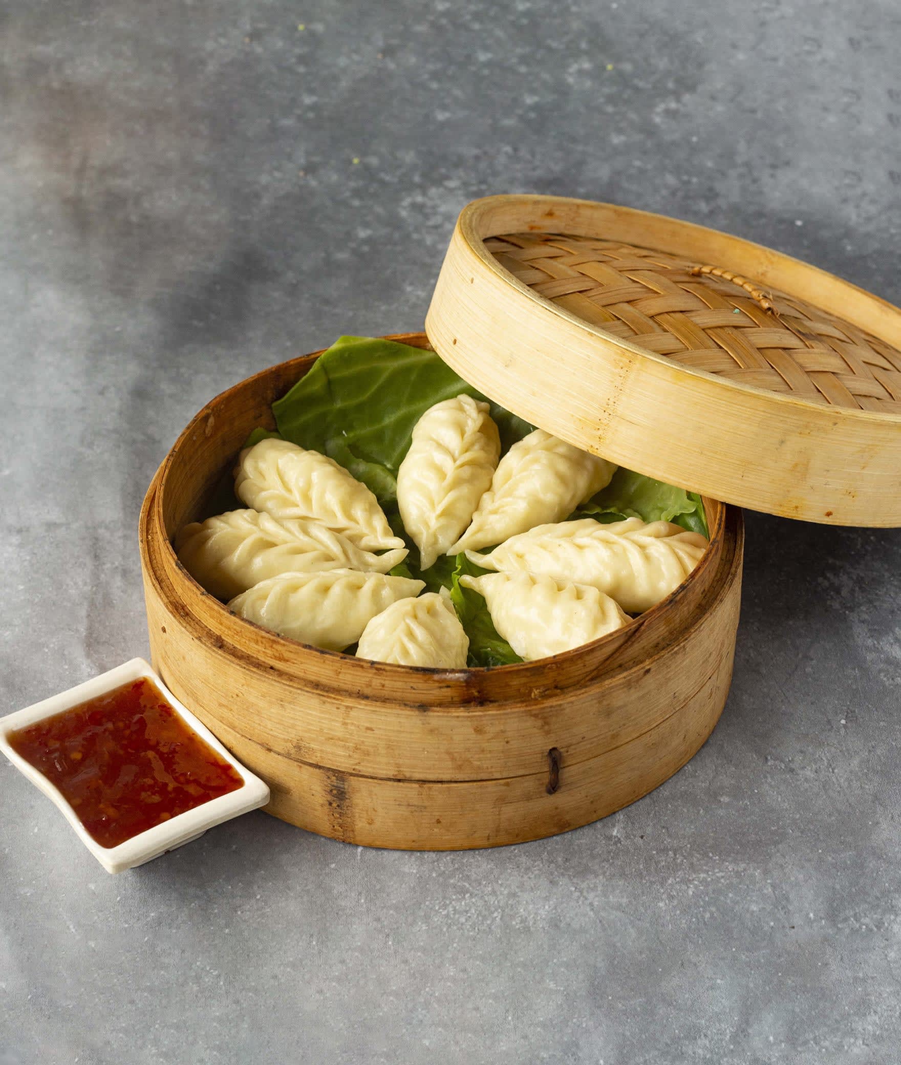 Baozi Momos - Logo