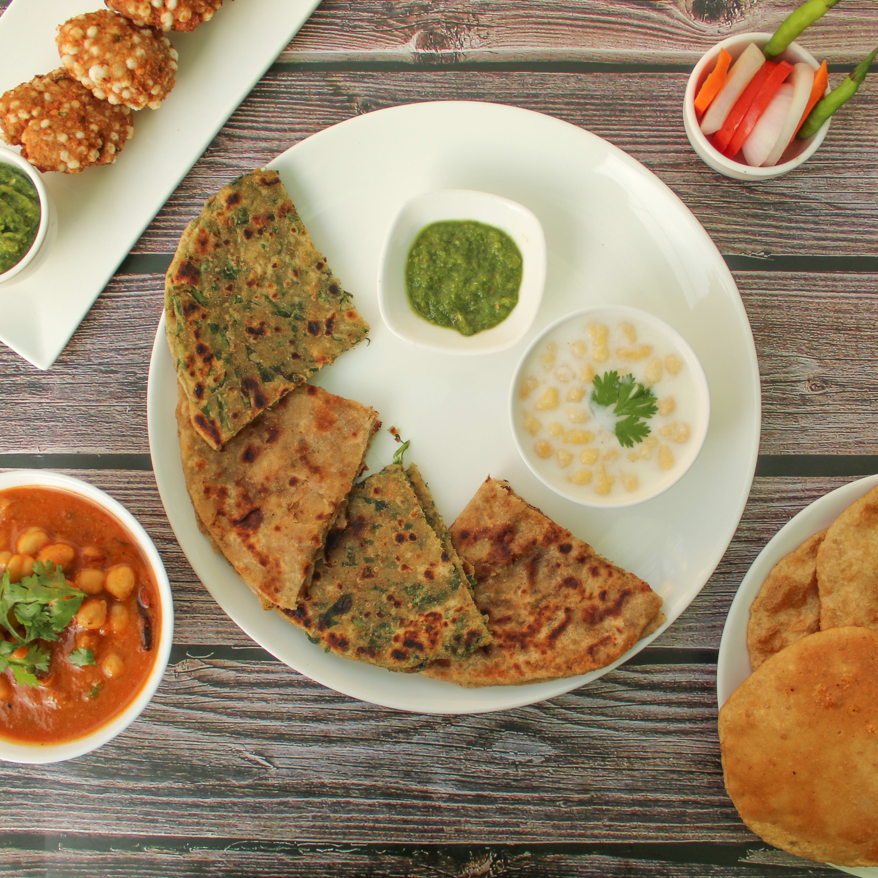 Bargat Ki Chhaon Main Paratha Shots - Logo