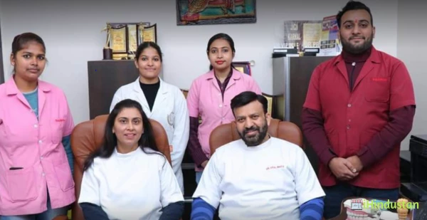 Bhatia Dental Care & Implant Centre - Logo