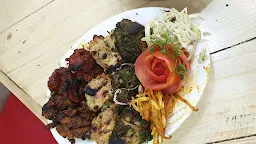 Bhavya Mejwani Restaurant - Logo