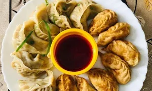 Big Momos World - Cover photo