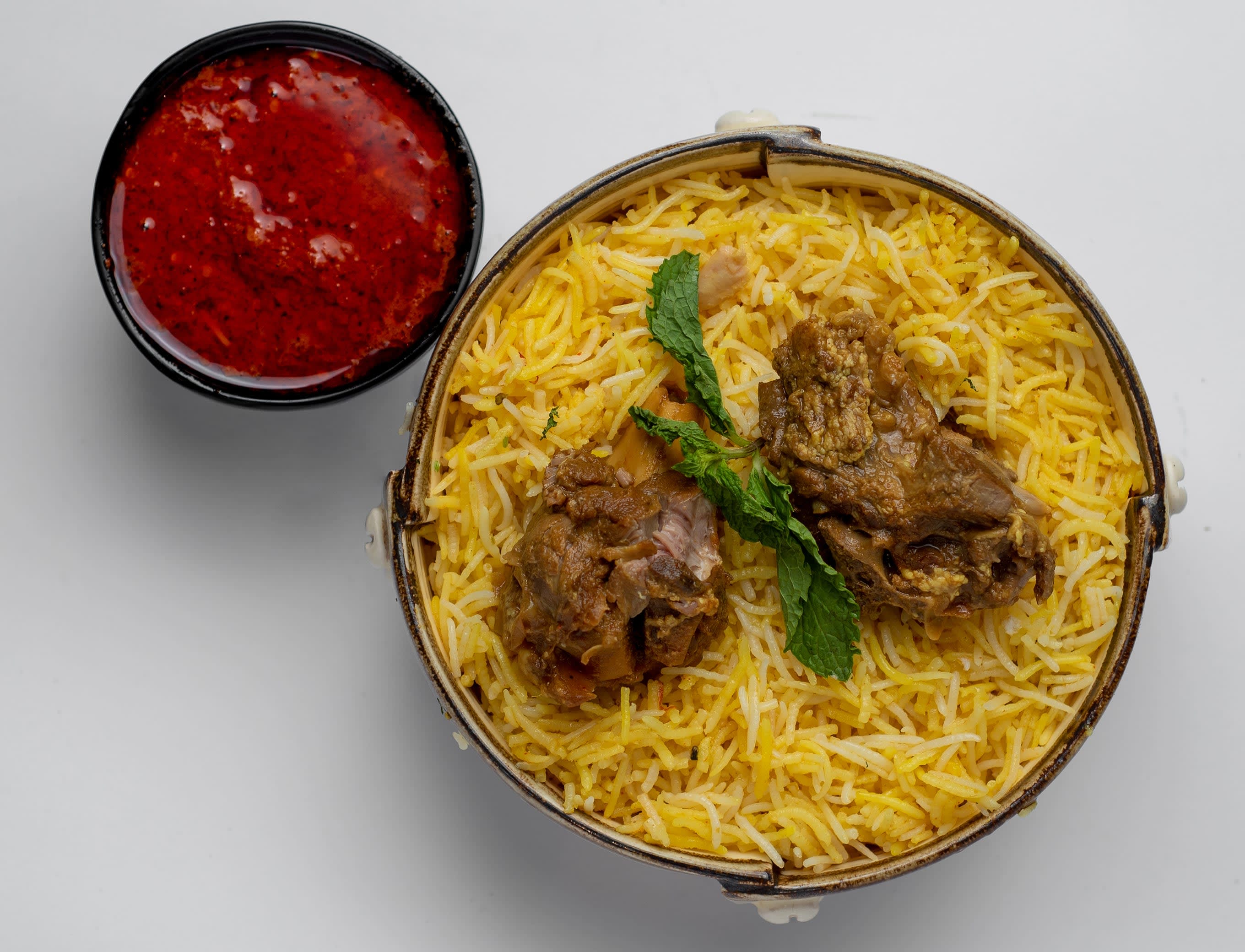 BIRYANIZ N CAKES (A Unit of Mala.Sinha Cafeteria Privat - Logo