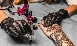 Bodycanvas Malad Tattoos & Piercing Studios - Logo