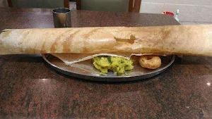 Brindhavan Vegetarian Restaurant - Logo