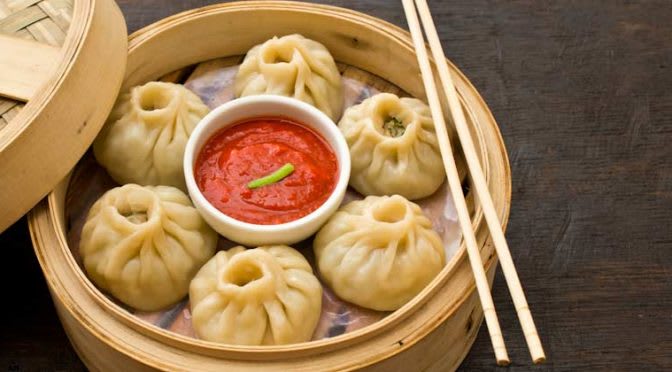 Cafe 99 Momos - Logo