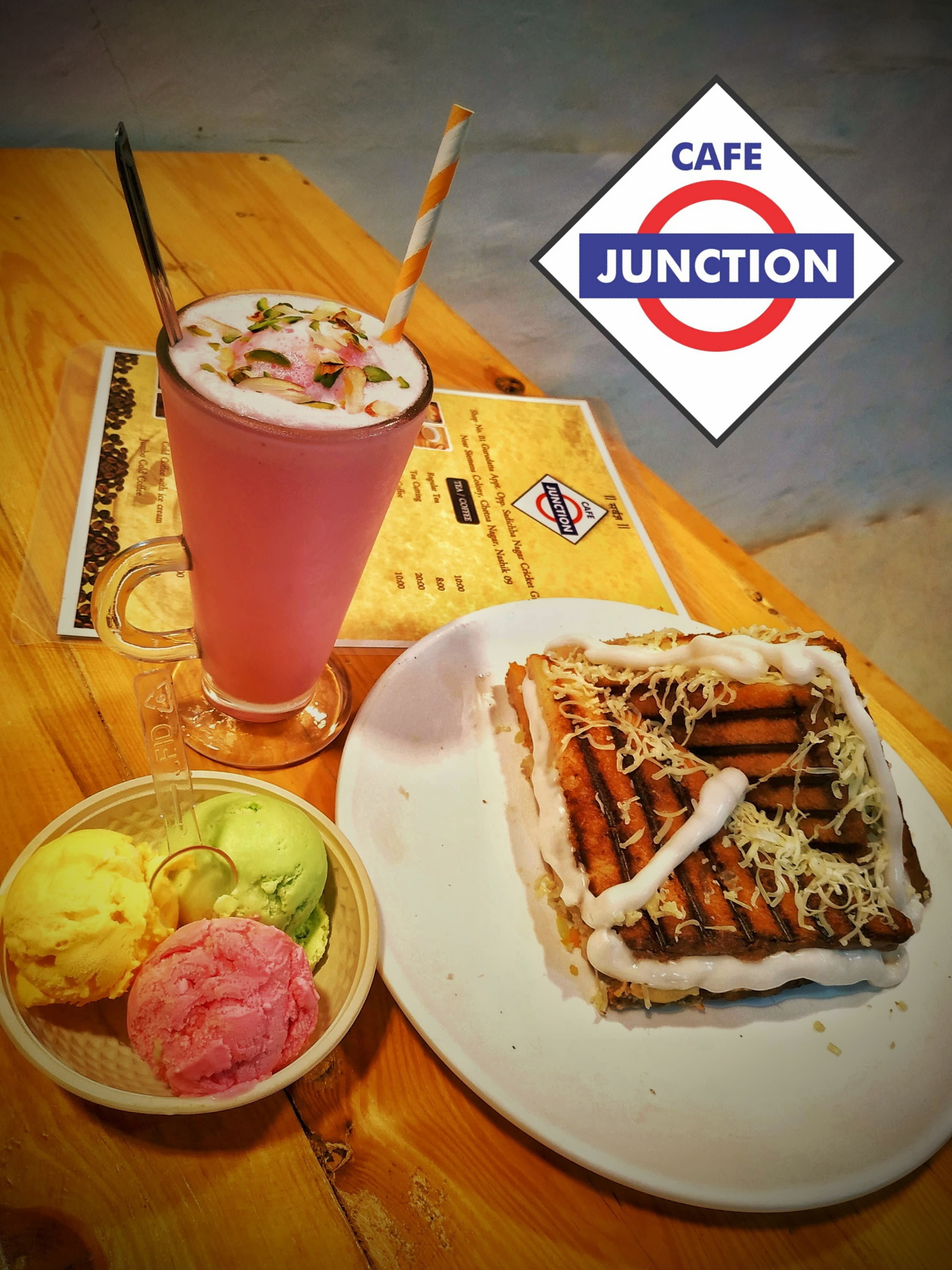 Cafe Junction And Icecream Parlour - Logo