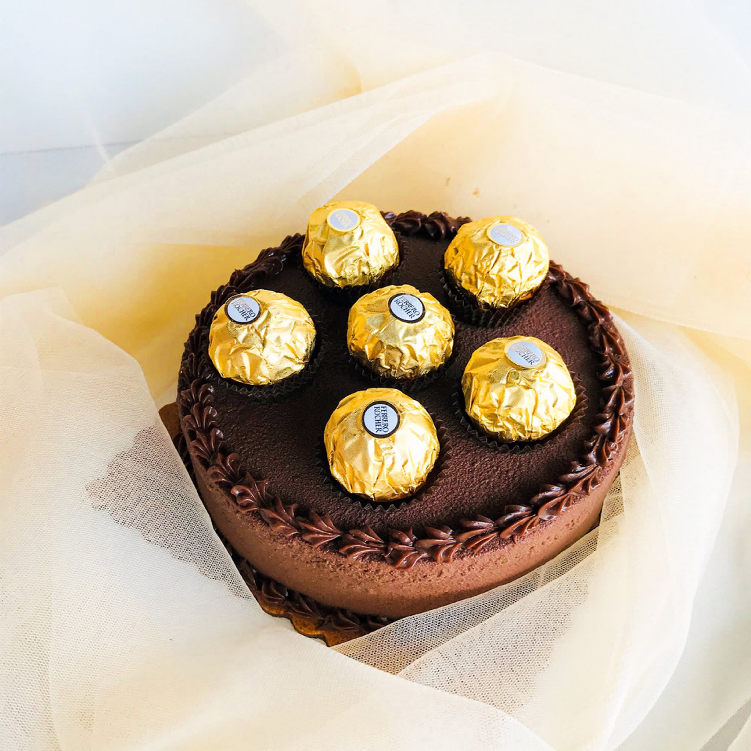 Cakes by Chocolates - Logo