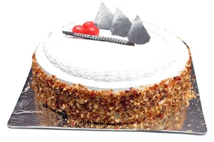 Carlos Cake Cafe - Logo