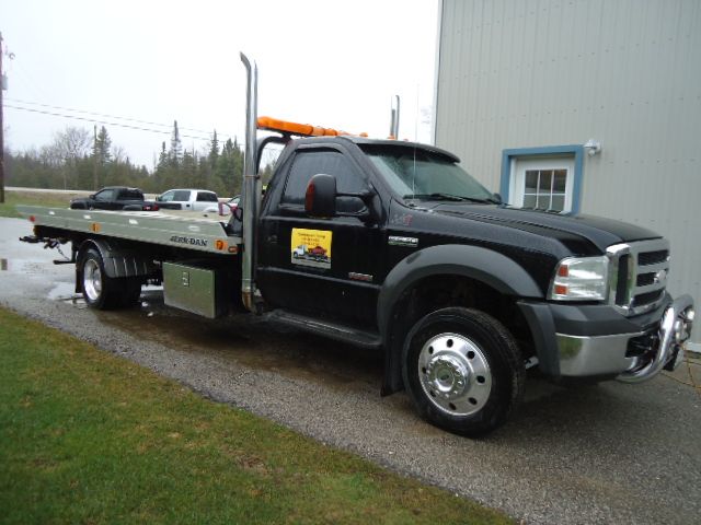 Champagne&s;s Towing 24 Hour Service - Logo