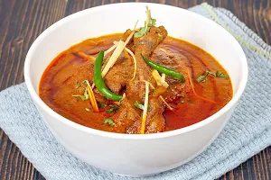 Chawla Chicken And Curries - Logo