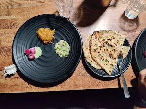Chawlas Restaurant - Logo